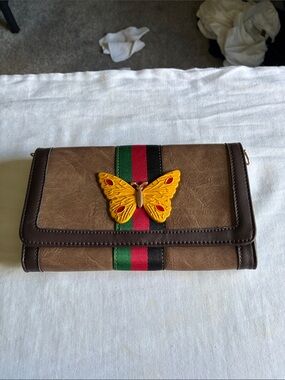 Brown Butterfly Accent Clutch with Green-Red-Black Stripe